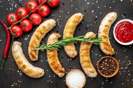 grilled-sausages-with-spices-stone-table